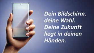 Eine Hand hält ein durchsichtiges Smartphone. Dein Bildschirm, deine Wahl.